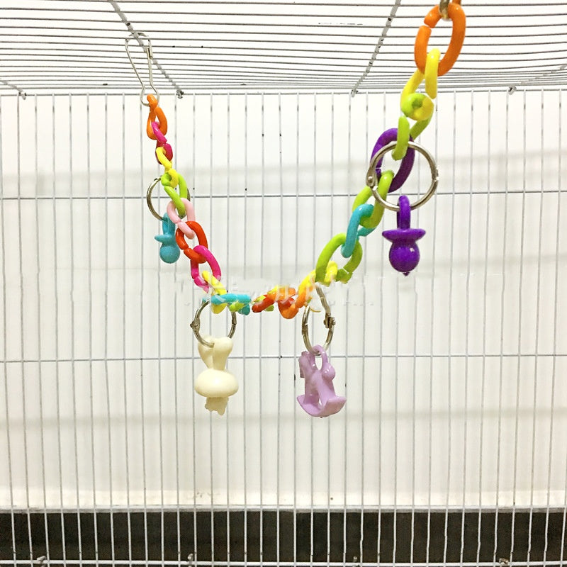 Juguete columpio para loros con puente colgante de cadena acrílica.